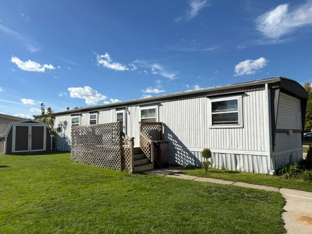 5338 Americana Lane manufactured home in Ravinia of Anchor Bay, Casco, MI — photo 2