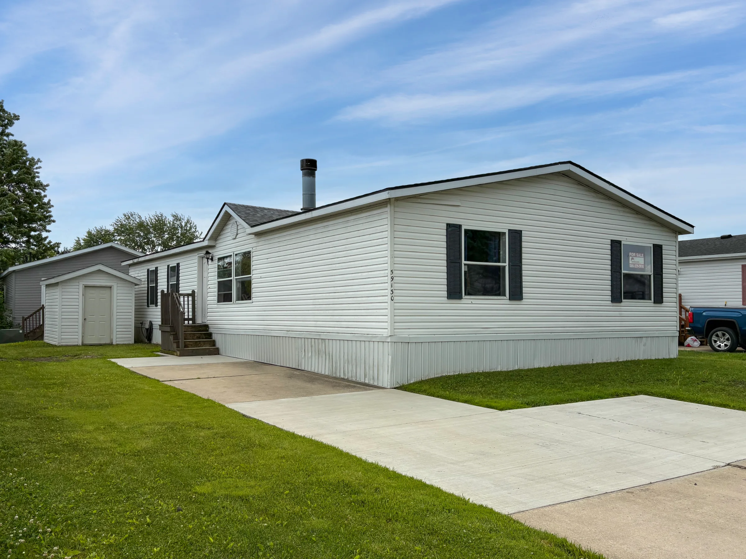 59130 Dawn Street manufactured home in Riverbrook, New Haven, MI