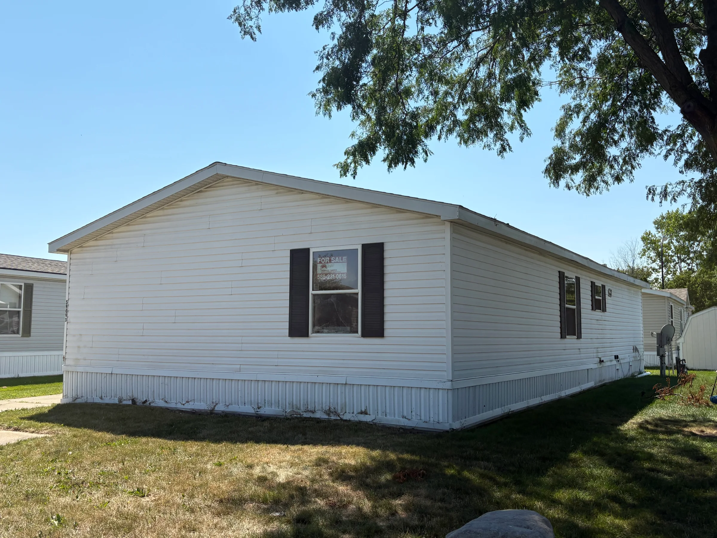 59093 Dawn Street manufactured home in Riverbrook, New Haven, MI