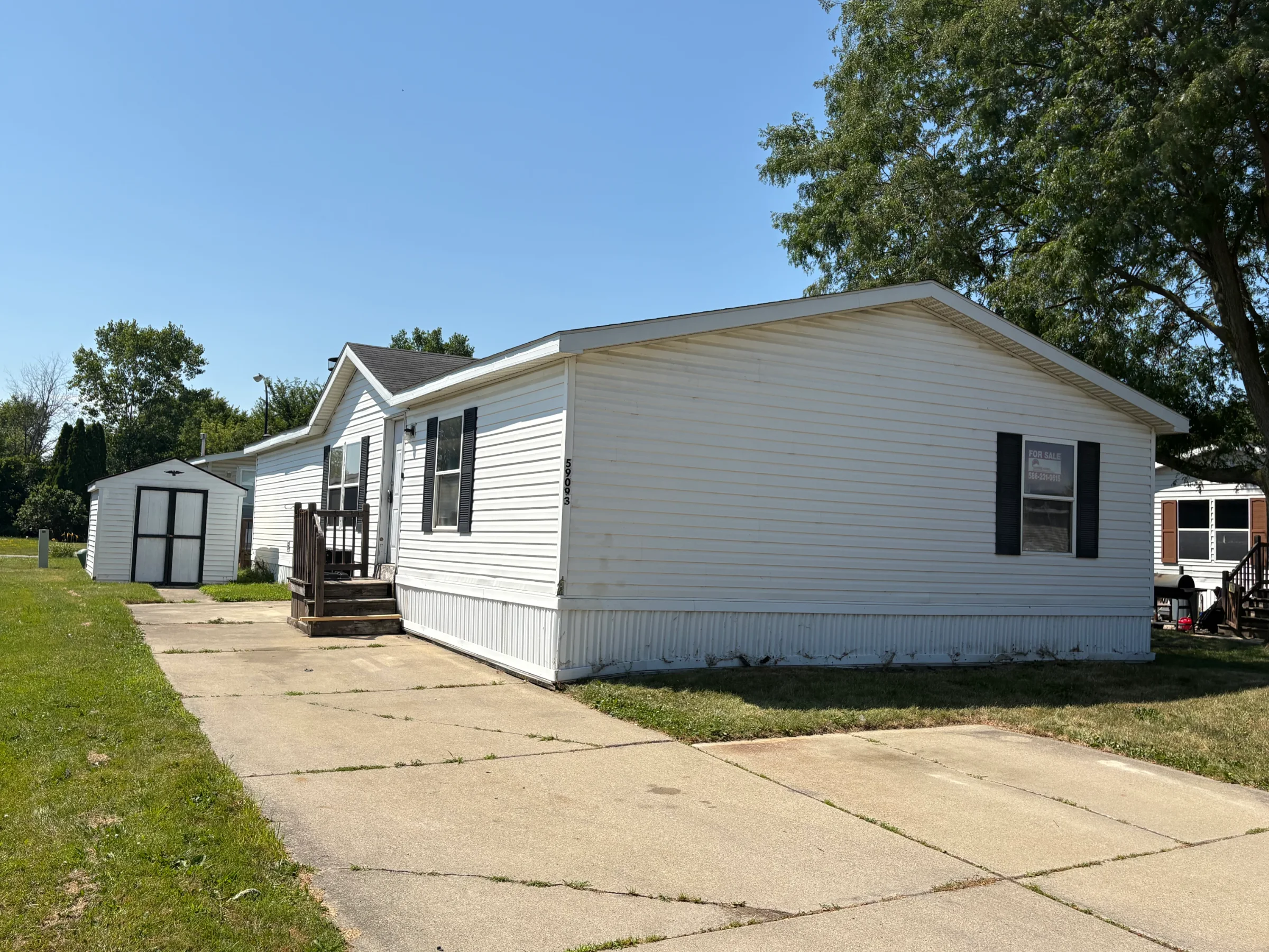 59093 Dawn Street manufactured home in Riverbrook, New Haven, MI — photo 1