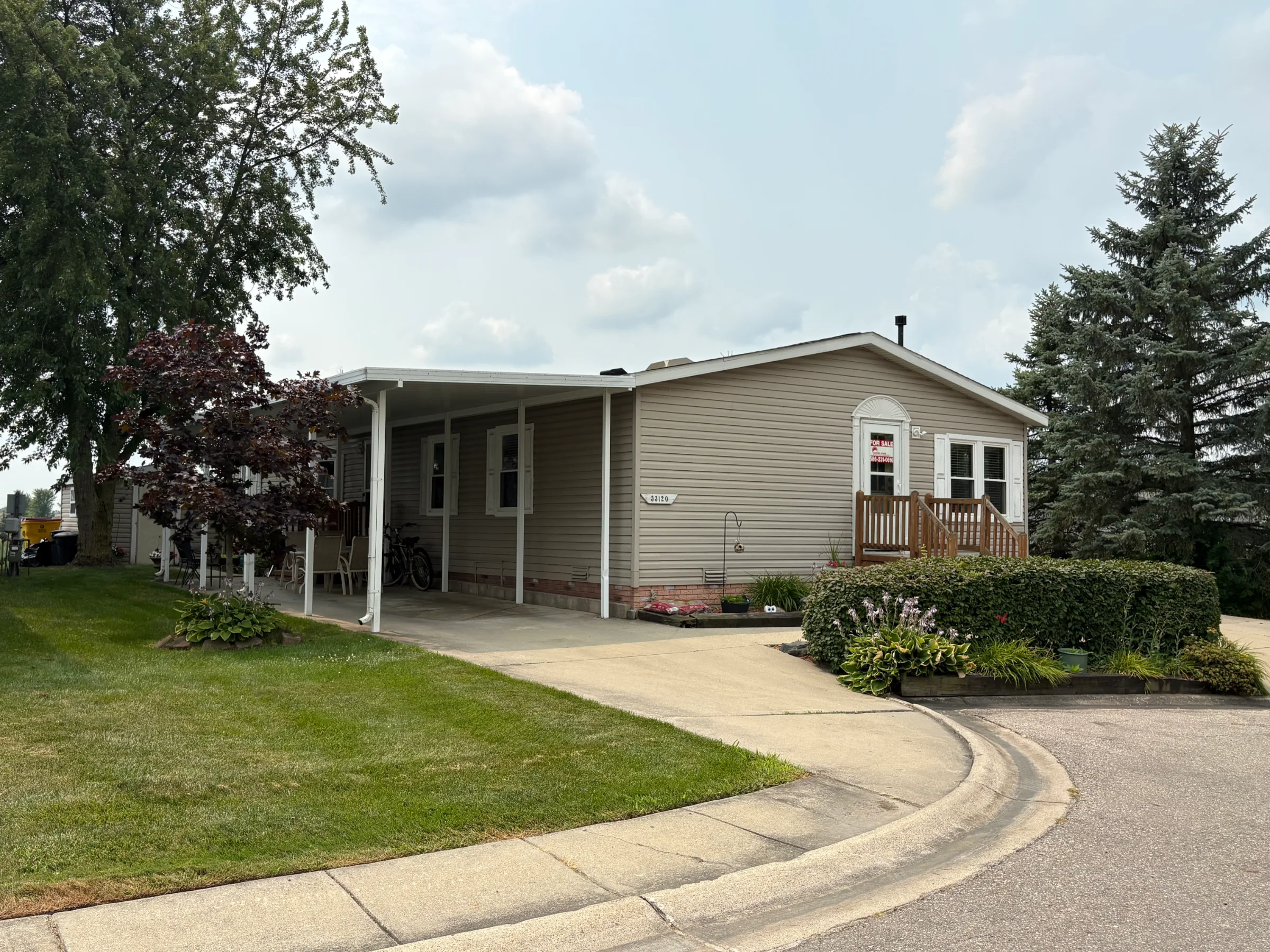 33120 Waterfall Court manufactured home in Meadow Creek, New Haven, MI — photo 1