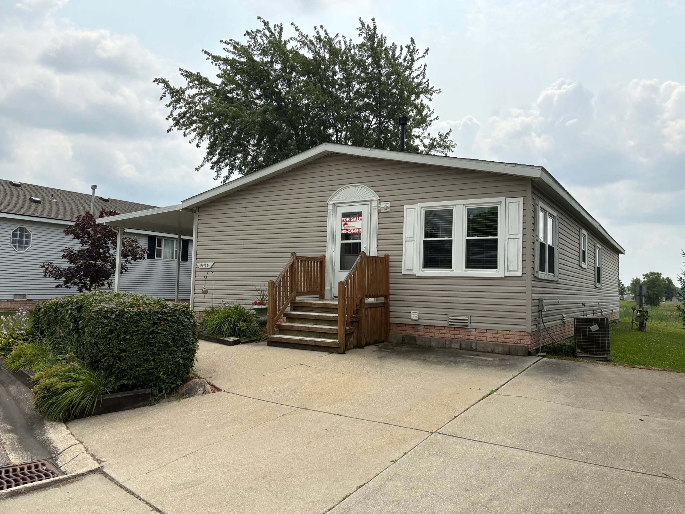 33120 Waterfall Court manufactured home in Meadow Creek, New Haven, MI — photo 2