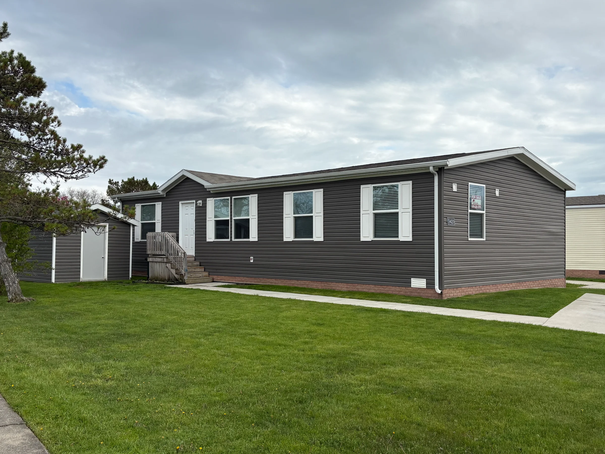 59420 Laine Lane manufactured home in Riverbrook, New Haven, MI